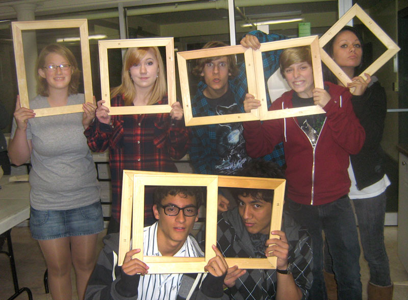 students with photo frames